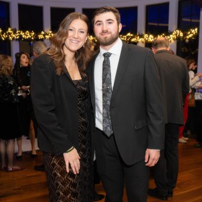 A couple poses for a photo at the annual Patron Party