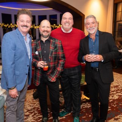 A Sugar Plum Tour volunteer greets guests