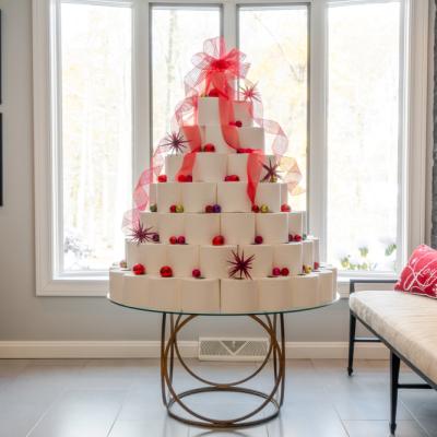A Christmas tree made out of toilet paper